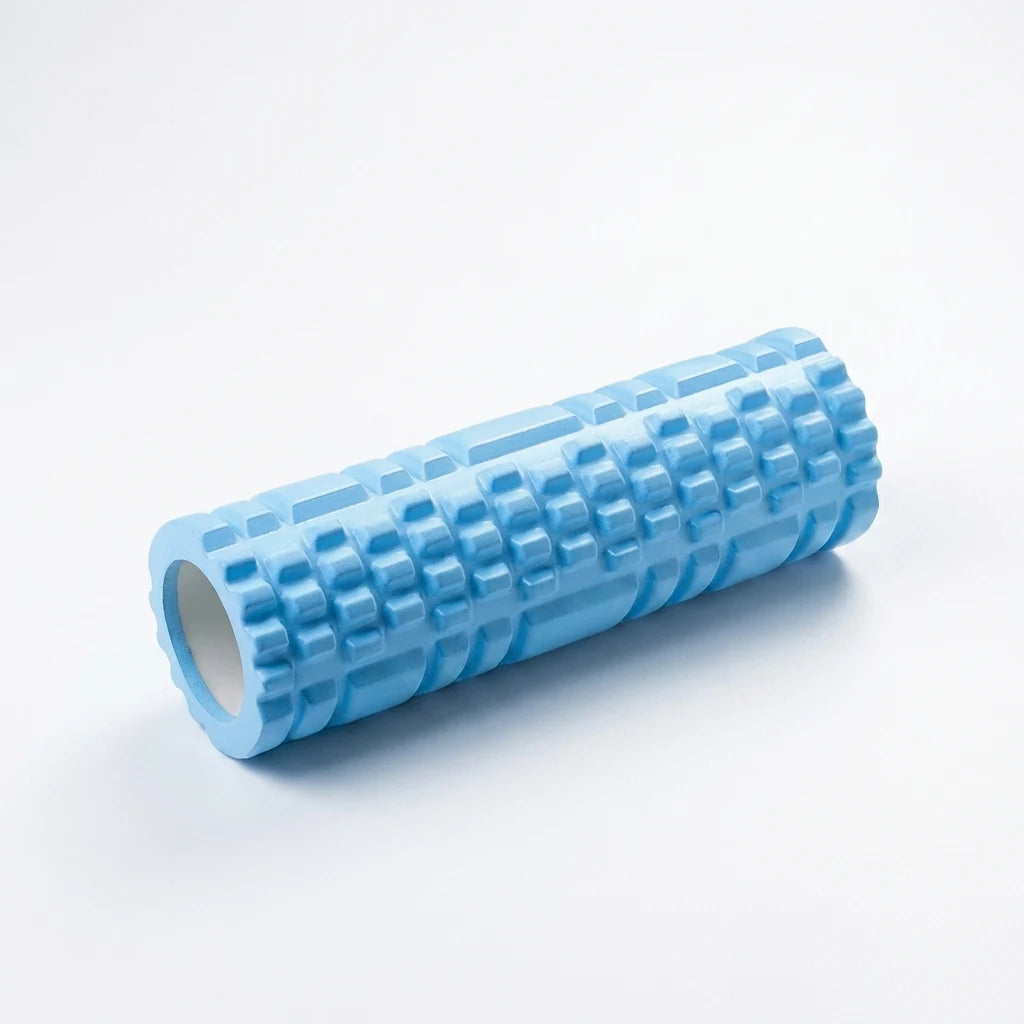 Blue textured fitness roller with home gym workout accessories