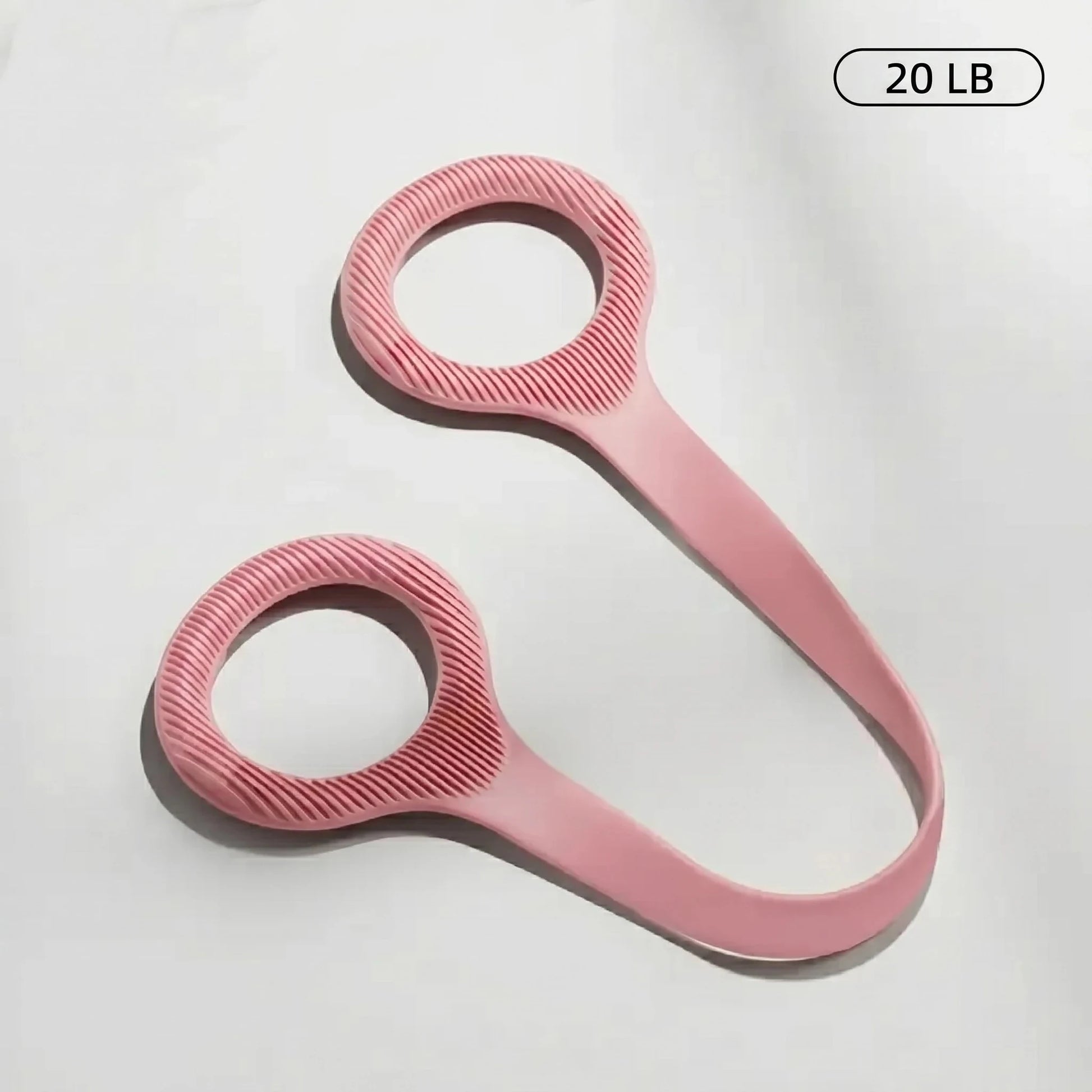 Pink loop resistance band with textured handles for home fitness