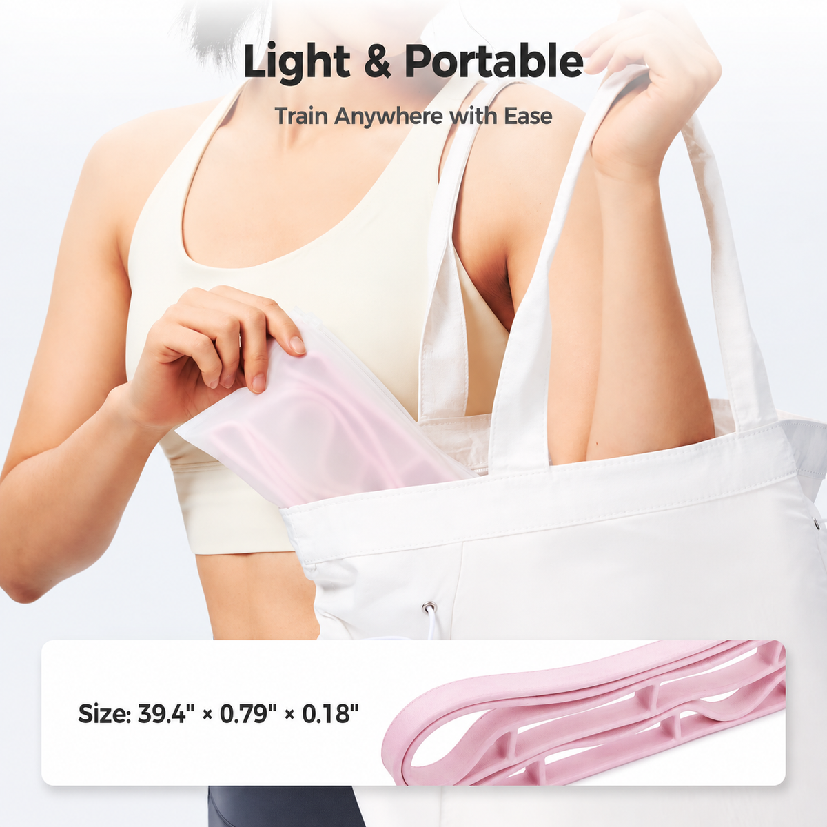 Compact pink resistance band packed into a white gym tote